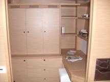 Wardrobe and desk in front port cabin