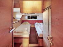 Twin single beds aft cabin.