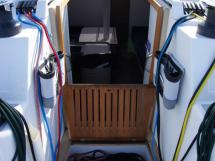 RM 1260 Biquilles / Twinkeels - Companionway and halyards locker