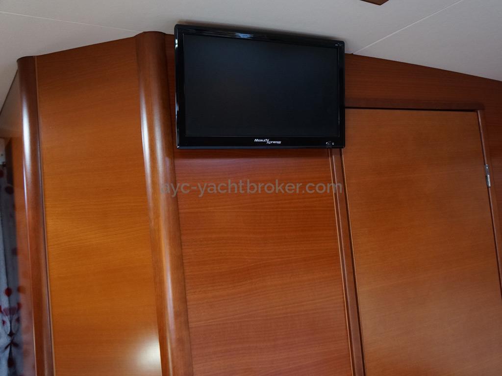Dufour 485 Grand Large Custom - TV in the forward cabin